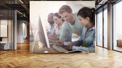 Group of young adults in business training Wall mural