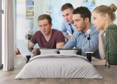 Group of young people in business training Wall mural