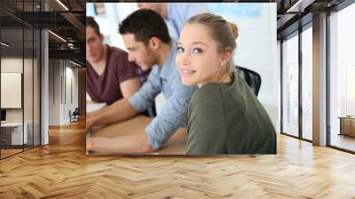 Group of young people in business training Wall mural