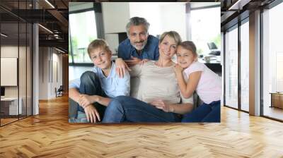 Happy family in contemporary house Wall mural