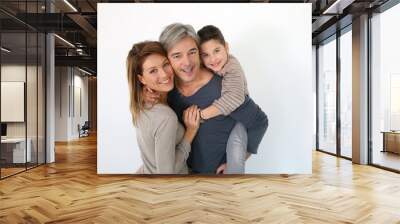 Happy family of three standing on white background Wall mural