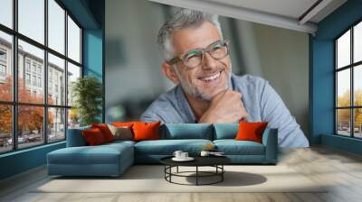 middle-aged guy with trendy eyeglasses Wall mural