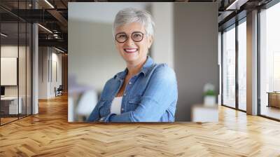 portrait of a beautiful smiling 50-year-old woman with white hair Wall mural