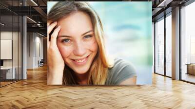 portrait of beautiful blond smiling woman Wall mural