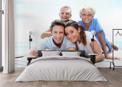 portrait of cheerful family on vacation in caribe Wall mural