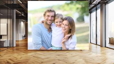 Portrait of happy family having fun together Wall mural