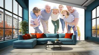 Portrait of happy intergenerational family Wall mural