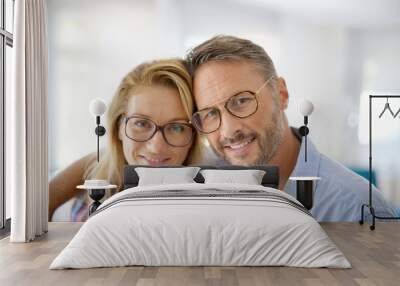 Portrait of mature couple wearing eyeglasses Wall mural