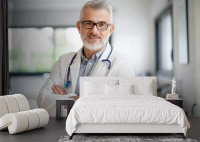 Portrait of mature doctor with eyeglasses Wall mural