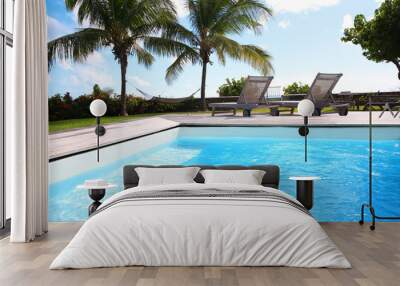 Private swimming pool in tropical area Wall mural