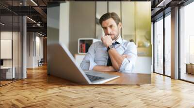 Relaxed attractive businessman working in modern office Wall mural