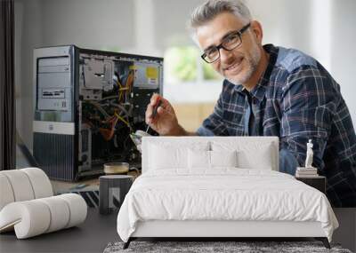 Technician repairing computer hardware Wall mural