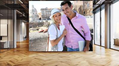 Tourists in Rome standing in front of Foro traiano Wall mural