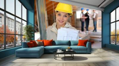 Young woman in construction professional training Wall mural