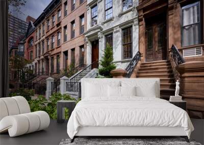 a row of colorful brownstone buildings Wall mural