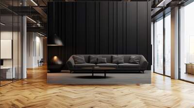 Black wall and black furniture in front of light fixture. Wall mural