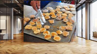 Coconut macaroon With young coconut On a hot stove, ready for sa Wall mural