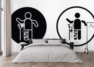 Man with broken leg vector icon set black filled and outlined style. Wall mural