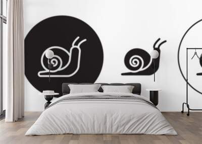 Snail vector icon set. cute snail with shell symbol. simple slow  slug sign. gastropods icon in black color. Wall mural