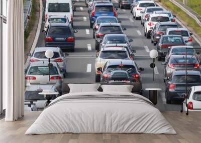 Rear view of traffic jam of lined up cars Wall mural