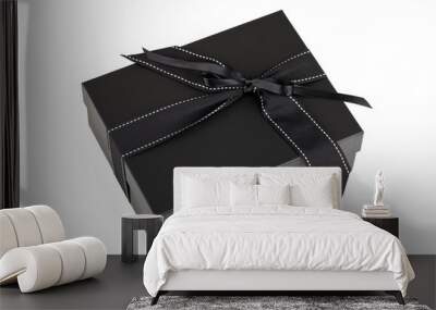 Black box with silk ribbon isolated on white Wall mural