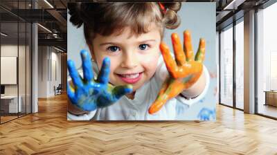 Little girl playing with colors Wall mural