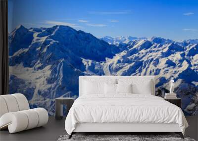 Panorama of Snow Mountain Range. Landscape with Blue Sky at Mt Fort Peak Alps Region Switzerland Wall mural