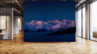 Scenic panorama sunset landscape of Crans-Montana range in Swiss Alps mountains with peak in background, Crans Montana, Switzerland. Wall mural