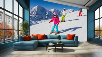 Skiing, winter, ski lesson - skiers on mountainside Wall mural