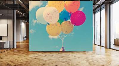 Vintage balloons flying in the sky Wall mural