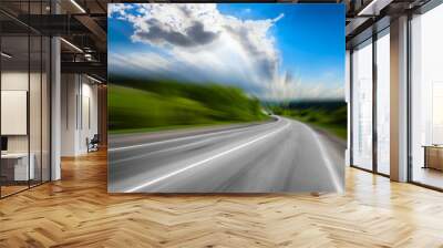 motion blurred road and cloudy blue sky Wall mural