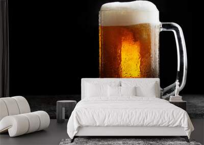 Mug of cold craft light beer on dark background.. Wall mural