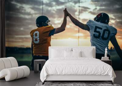 American Football Game Start Teams Ready: Two Professional Players Walk on Field Determined to Win the Match. Competitive Friends do Celebration High-Five. Back View Shot Wall mural