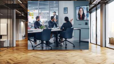 Businesspeople do Video Conference Call with Big Wall TV in Office Meeting Room. Diverse Team of Creative Entrepreneurs at Big Table have Discussion. Specialists work in Digital e-Commerce Startup Wall mural