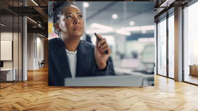 Busy African American Female Manager Using Computer in Modern Office. Overworked Tired Employee Dealing with Hard Work Tasks. Stressed Beautiful Woman Exhausted to Come Up with New Business Ideas. Wall mural