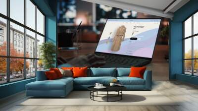 Close Up on Hands of a Female Using Laptop Computer with Clothing Online Web Store to Choose and Buy New Stylish Coat. Office Studio Apartment in the Evening with Big Windows. Wall mural