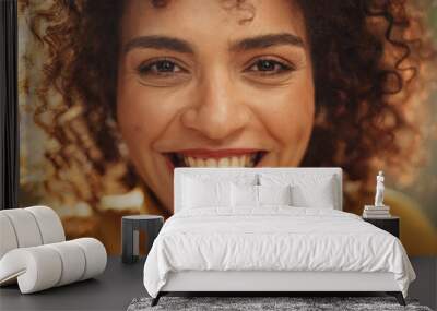 Close Up Portrait of a Young Middle Eastern Woman with Short Curly Hair, Looking for Camera, Wearing a Yellow Sweater. Beautiful Diverse Multiethnic Female Wearing Yellow Smiling and Being Happy. Wall mural