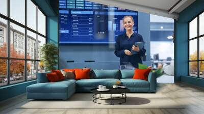 Diverse Modern Office: Portrait of Successful Caucasian Businesswoman Uses TV Screen with Big Data, Statistics, Talks about Company Growth. Creative Digital Entrepreneurs Work on e-Commerce Project Wall mural