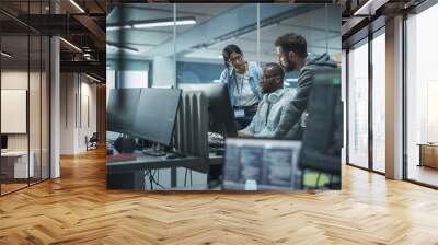 Diverse Multi-Ethnic Team Working in Modern Office: Group of IT Programmers Gather Around Desktop Computer, Talking, Finding Solution. Specialists Create Software. Engineers Develop App, Program Wall mural