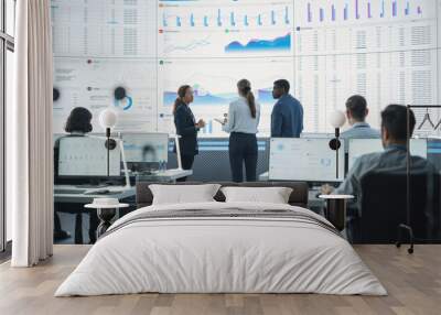 Diverse Team Of Data Scientists Analyzing Information And Graphs On Big Digital Screen In Modern Monitoring Office. Multiethnic Employees Working Infront Of Desktop Computers In Consulting Firm. Wall mural