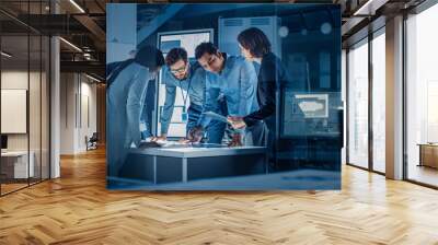 Engineers Meeting in Technology Research Laboratory: Engineers, Scientists and Developers Gathered Around Illuminated Conference Table, Talking and Finding Solution. Industrial Design Facility Wall mural