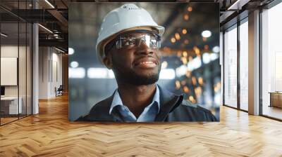 happy professional heavy industry engineer/worker wearing uniform, glasses and hard hat in a steel f Wall mural