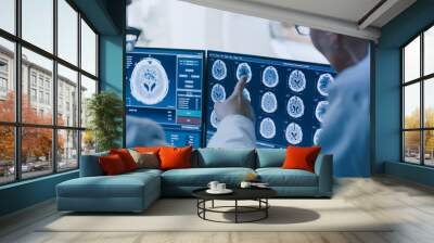 In Control Room Doctor and Radiologist Discuss Diagnosis while Watching Procedure and Monitors Showing Brain Scans Results, In the Background Patient Undergoes MRI or CT Scan Procedure. Wall mural