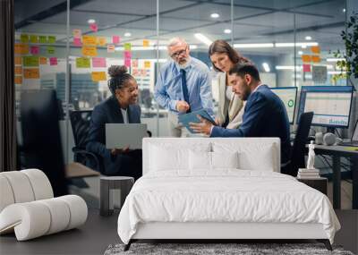 In Modern Office: Diverse Team of Managers Use Laptop and Tablet Computers at a Company Meeting Discussing Business Projects. Young, Motivated and Experienced Employees Brainstorm in Conference Room. Wall mural