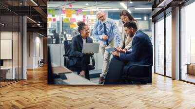 In Modern Office: Diverse Team of Managers Use Laptop and Tablet Computers at a Company Meeting Discussing Business Projects. Young, Motivated and Experienced Employees Brainstorm in Conference Room. Wall mural