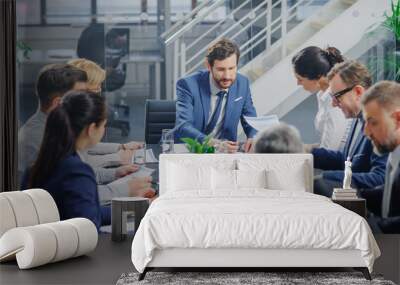 In the Modern Corporate Office Meeting Room: Diverse Group of Businesspeople, Lawyers, Executives and Members of the Board of Directors Talking, Negotiating, Use Documents and Consult Statistic Graphs Wall mural