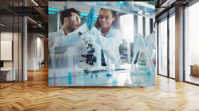 Modern Medical Research Laboratory: Portrait of Latin, Black Young Scientists Using Microscope and Giving High Five after Receiving Successful Results. Diverse Team of Specialists work in Advanced Lab Wall mural