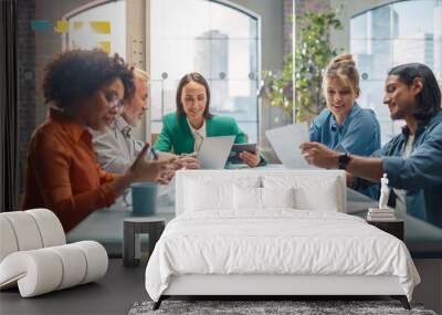 Modern Multi-Ethnic Architectural Agency Office Meeting. Group of Professional Architects, Designers Discussing Design Sustainable, Energy Efficient Housing Project, Using Laptop Tablet, Statistics Wall mural