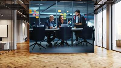 Office Conference Room Meeting: Diverse Team of Top Managers Talk, Brainstorm, Use Laptop Computer. Business Partners Discuss Financial Reports, Plan Investment Strategy and Managerial Operations. Wall mural