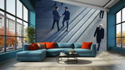 Office Managers and Business People Commute to Work in the Morning or from Office on a Sunny Day on Foot. Pedestrians are Dressed Smartly. Two Businessmen Shake Hands. Shot from Above. Wall mural